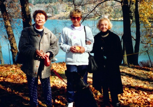 Left to Right: Joan Iversen, her sister, Dawn Danielson, and her mother, Jean McAtamney. Kali is in front.